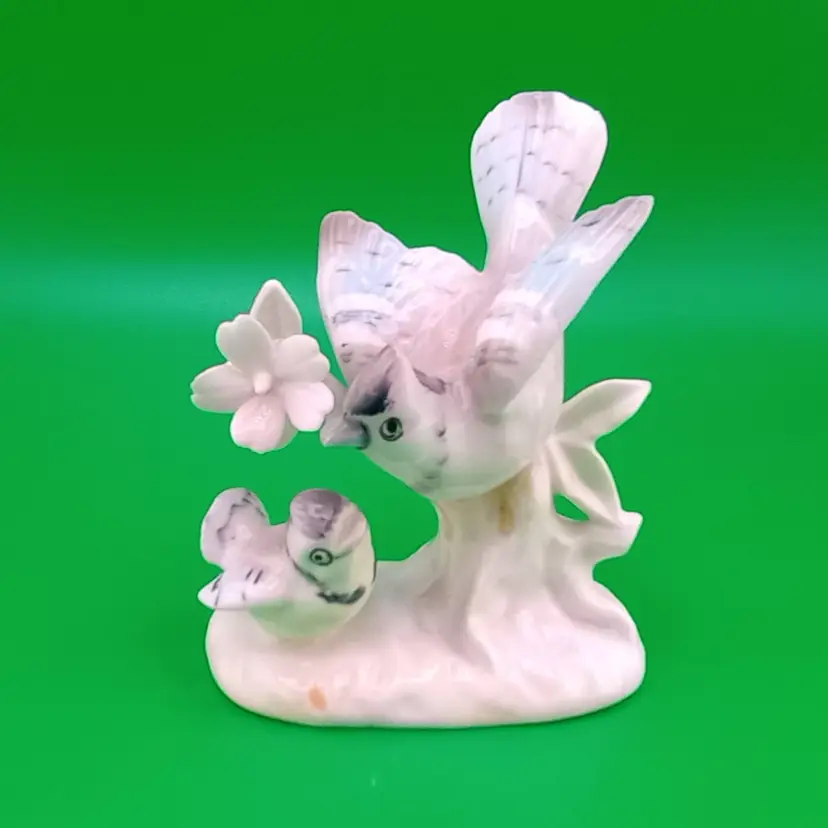 Mama and baby bird figurine