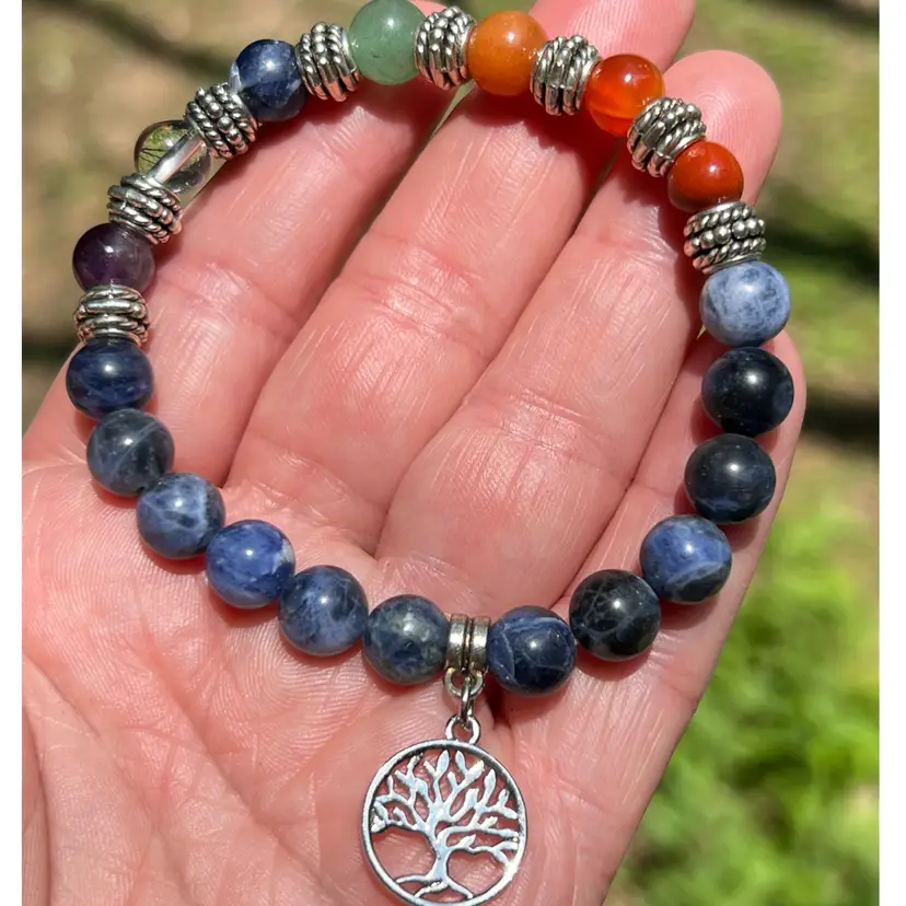 7 Chakra 8mm Beads Rainbow Bracelet. 6-3/4" to 7-1/4” Stretch With Tree Of Life Charm.