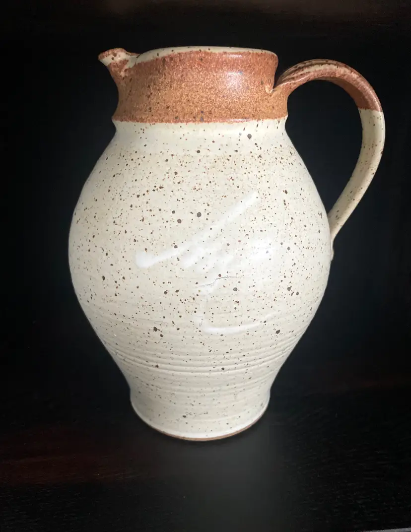 Large Pottery Pitcher. 
Signed L Riley