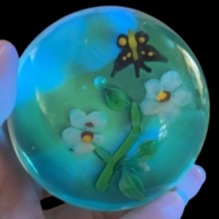 “Glows Green”UV Reactive Paperweight Blue w/ Butterfly & Flowers 2.75”