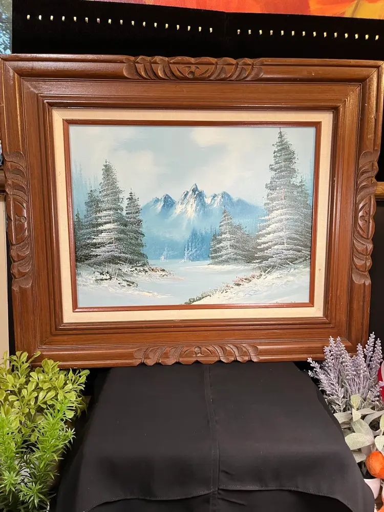 Oil Painting of Winter Landscape of Snow Covered Mountains, Evergreen Trees, & a Body of Water, Signed-Lot 61