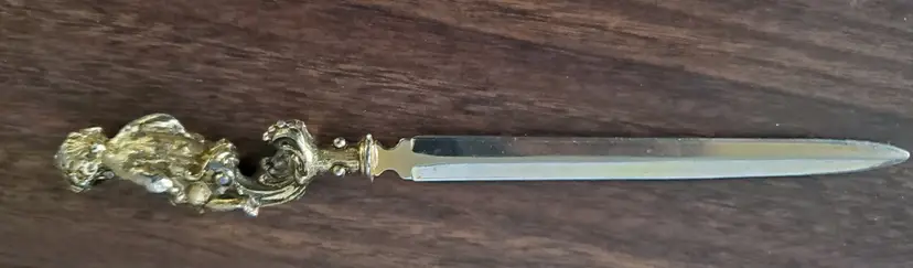 Vintage CHILD SITTING AND RIDING A WAVE Letter Opener Gold Tone 6.5 Inch UNUAUAL