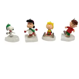 2010 Hallmark The Peanuts Gang on Ice Set of 4 Keepsake Miniature Ornaments IOB