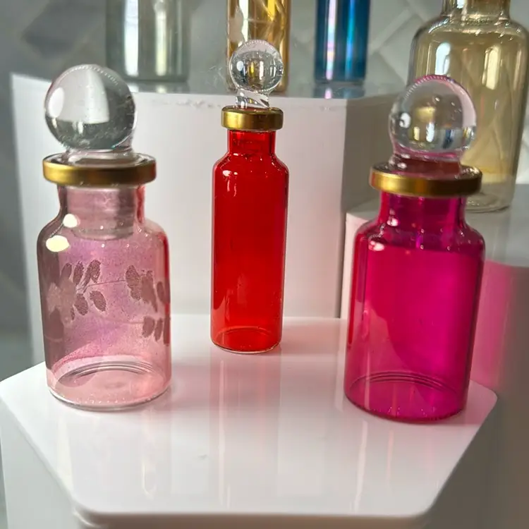 Egyptian Perfume bottles, Empty Glass Mini Bottles for Perfume, Essential Oils or Potion - Set of 9 Decorative Small Vials, Each 2"-3” High, Assorted Colors