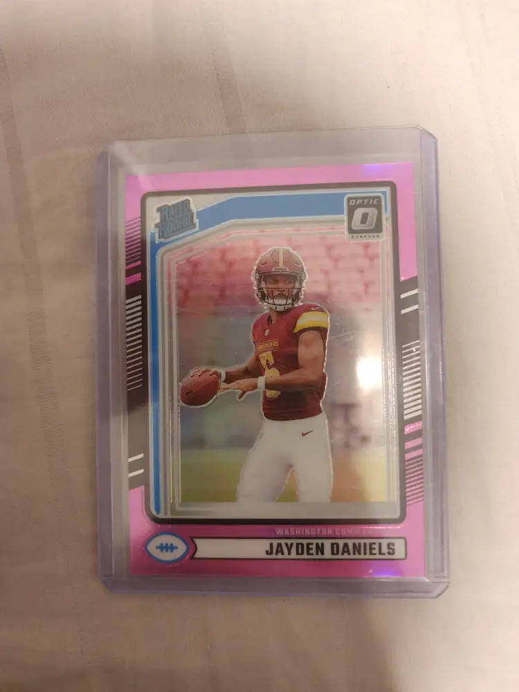 Jayden Daniels Commanders Donruss Optic #389 Rated Rookie Pink Parallel