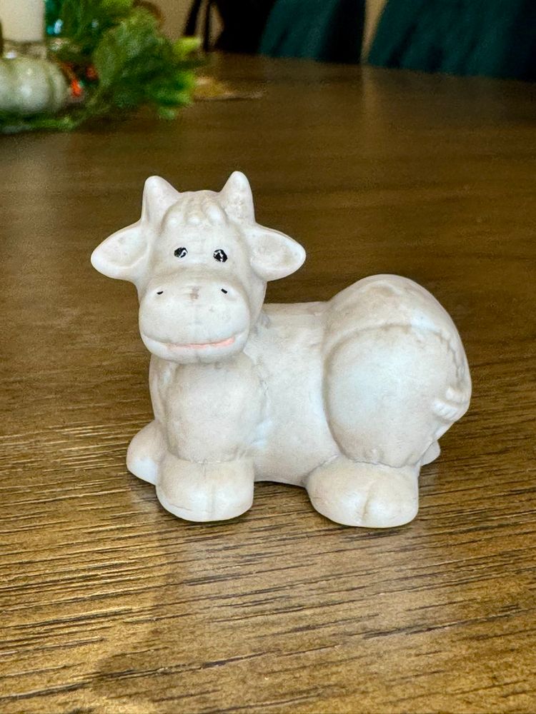 Mini itty bitty figurine is made of porcelain bisque and is hand-painted.