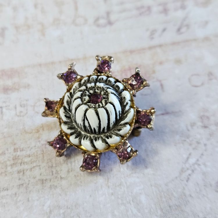 White Floral Brooch with Dark Lavender Prong Set Stones