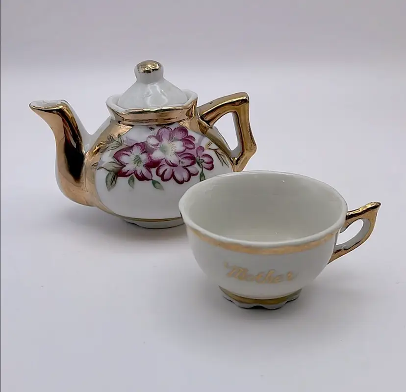 Hand painted, Miniature Porcelain Teapot and “Mother” Cup, Violets and Gold Accents