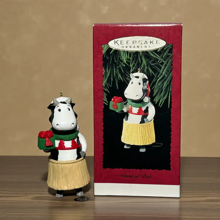 Hallmark Christmas Ornament Cows Of Bali Grass Skirt 1995