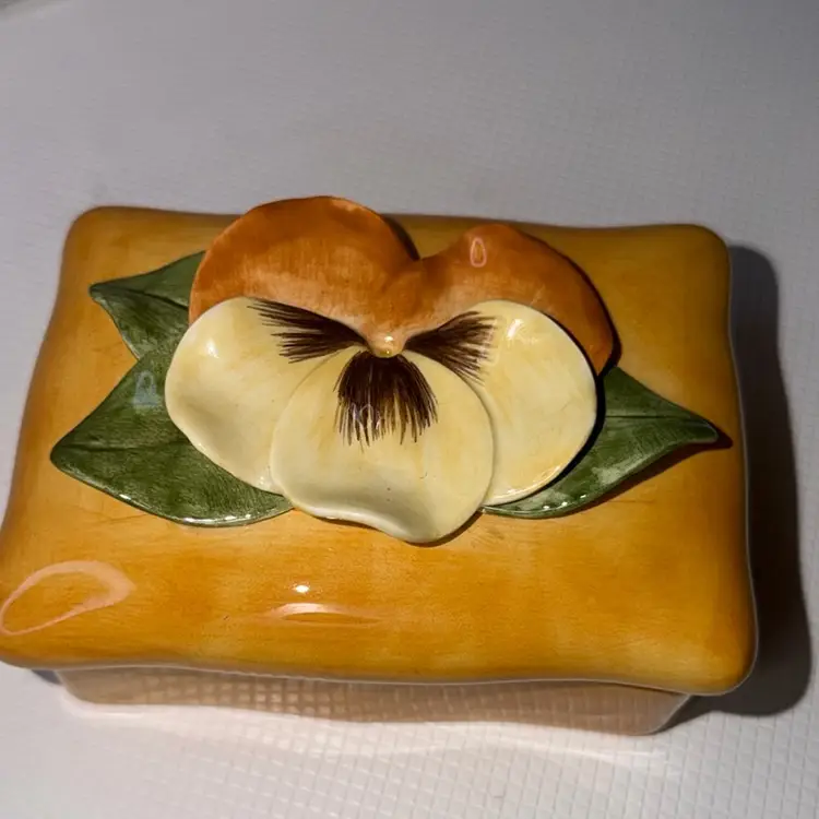 Fits And Floyd Trinket Dish With A Flower On It