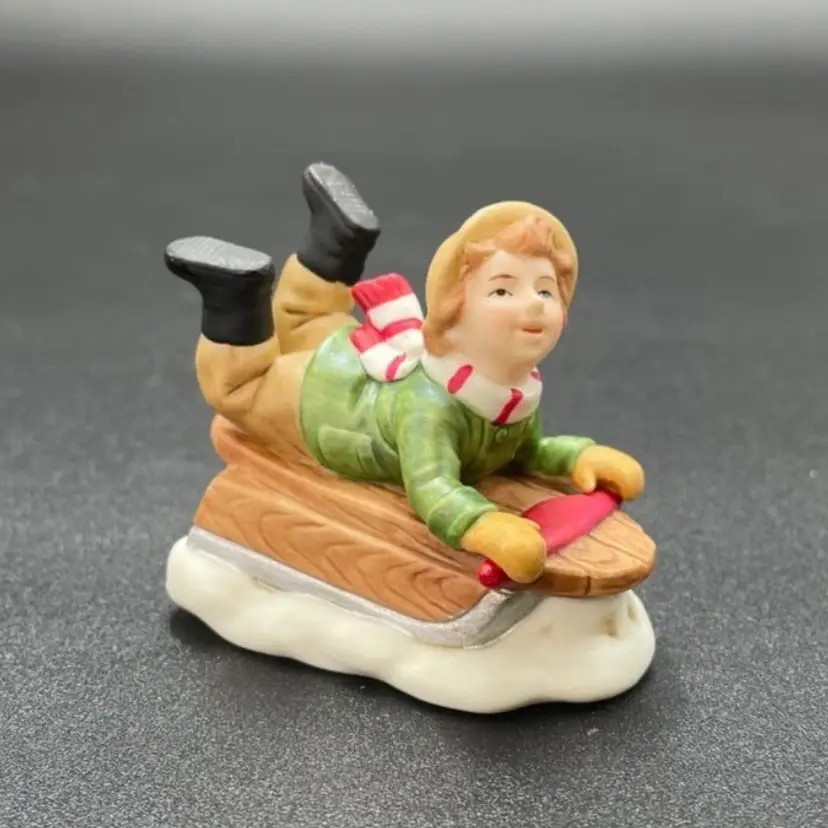 Lefton 00657 Colonial Village Tommy Reid Boy on Sled Miniature Figurine Christmas Holiday