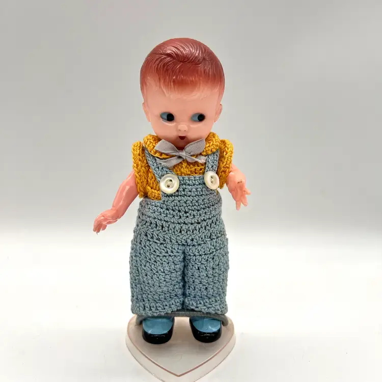 Vintage Knickerbocker Rattle Boy Doll In Crochet Outfit With Stand