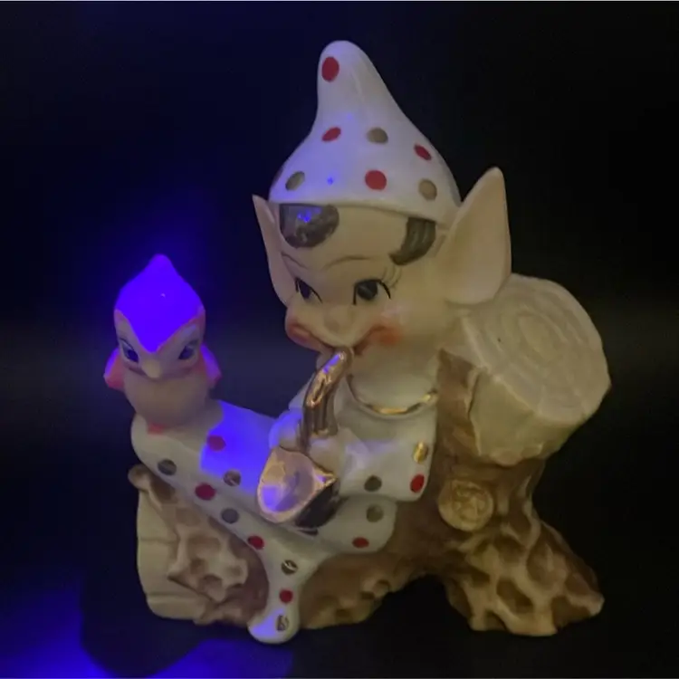 Pixie On A Log With Birdie