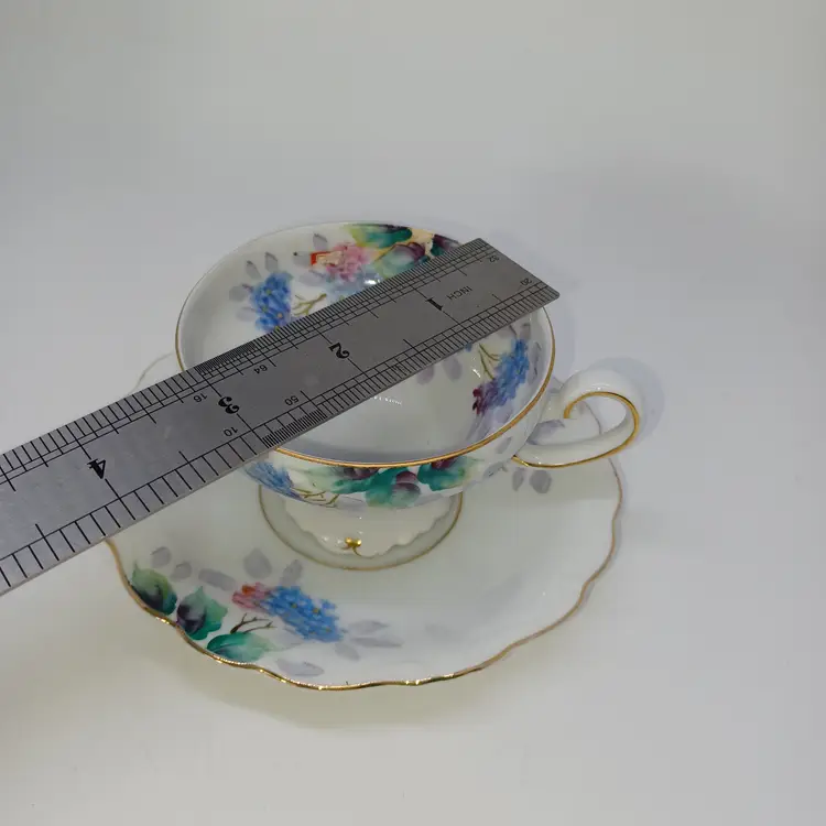 Vintage Hand Painted Cup and Saucer Made in Occupied Japan.