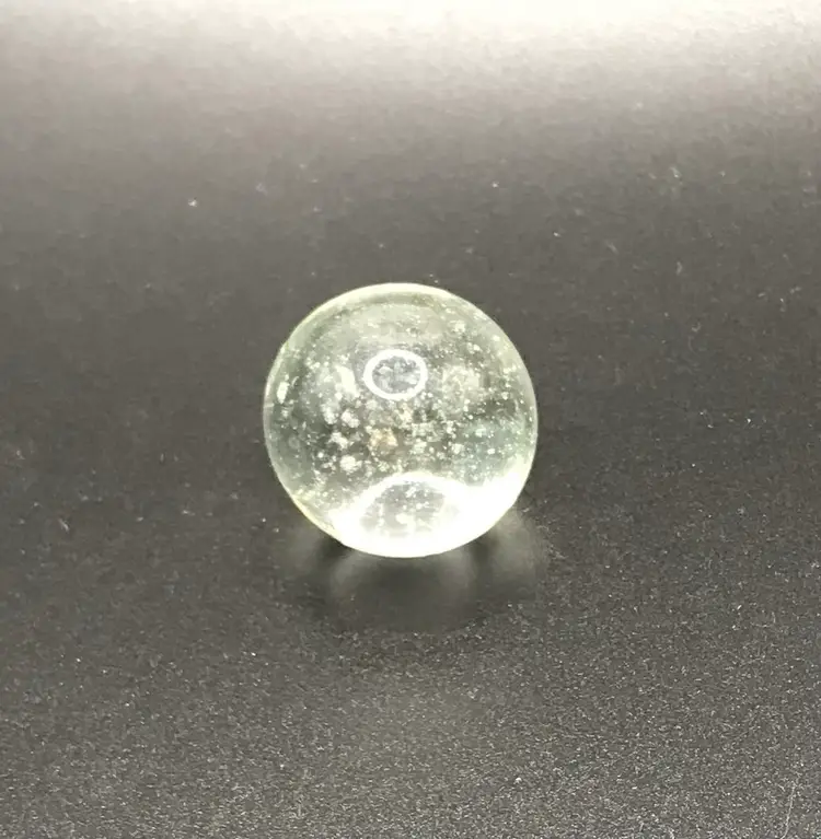 Single clear 1" art glass shooter marble bubble -has defect in glass