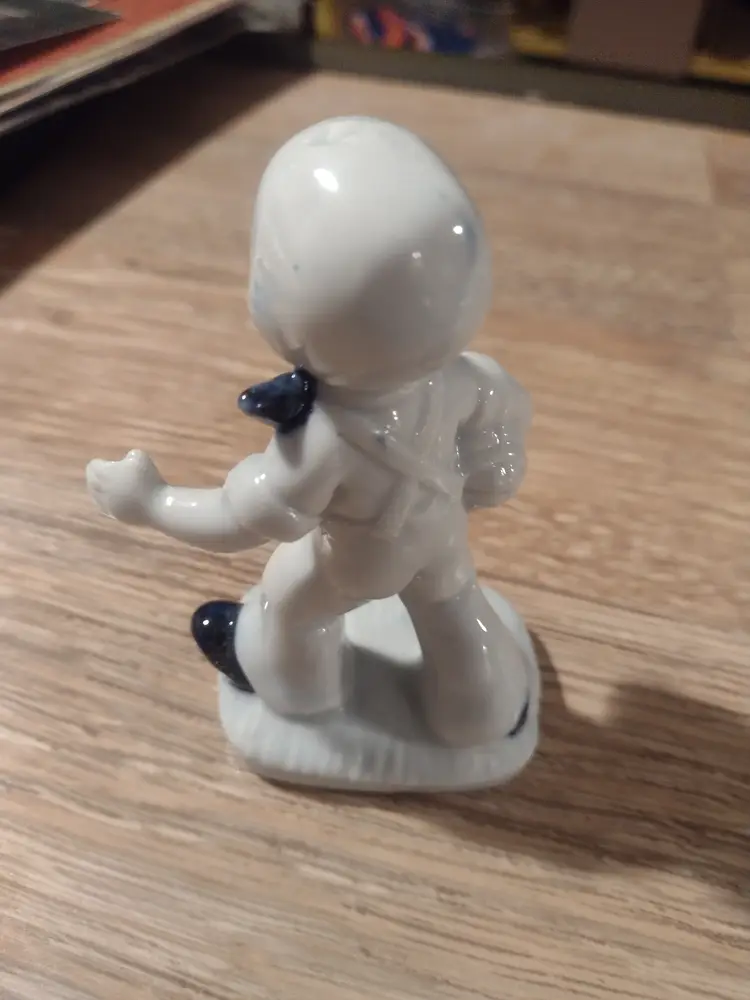 Vintage porcelain boy playing Football figurine in good condition