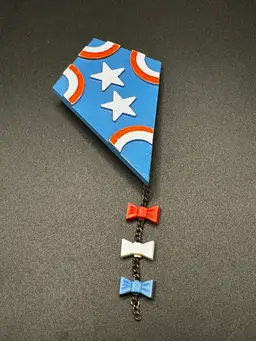 A078 - Avon 1973 Patriotic Color Kite Brooch