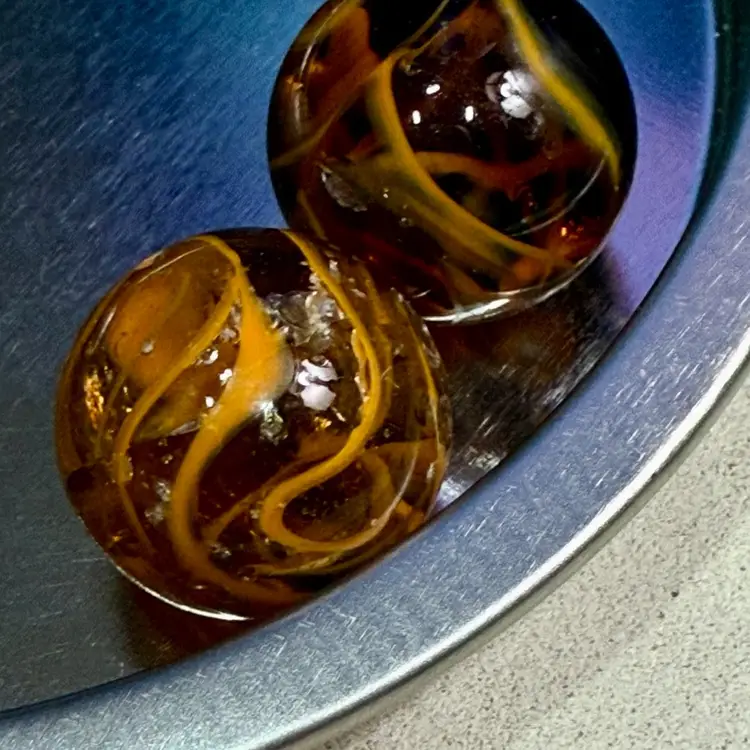 Two Dark And Light Orange /Brown Swirl Marbles