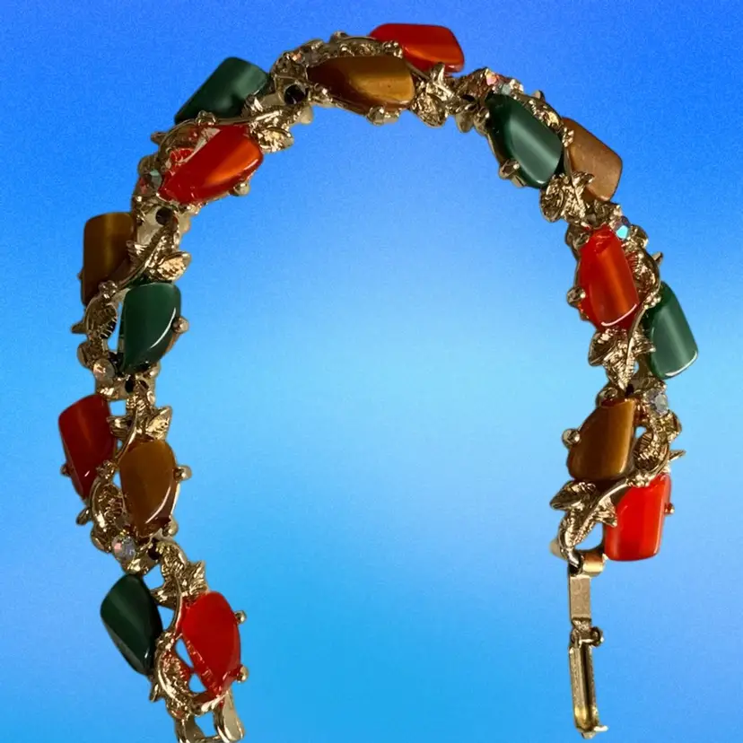 1950s  Gold Tone Red, Green, Tan Thermoset Bracelet With Fold Over Clasp