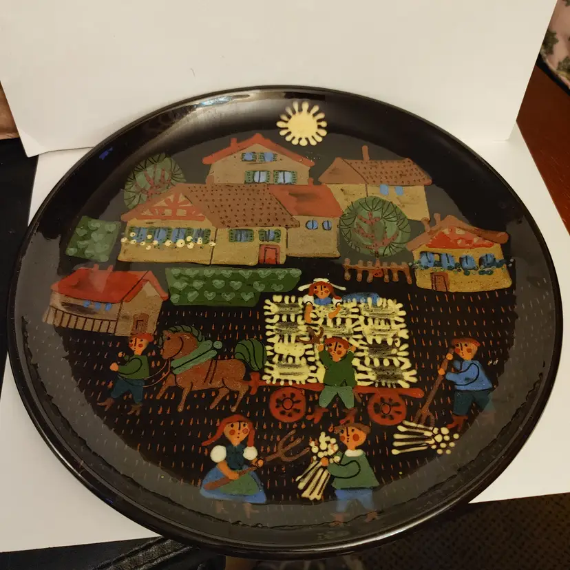 Vintage Swiss Folk Art decorative plate by Jakob Stucki. 12.5 inch diameter. No chips or cracks.