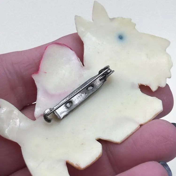 Vintage Occupied Japan Celluloid Figural Brooch, circa late 1940s–early 1950s