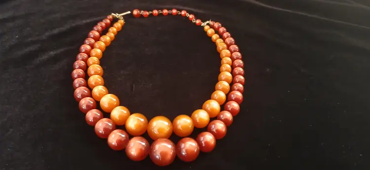 Vintage 1960s Orange Moonglow double strandfaux pearl necklace