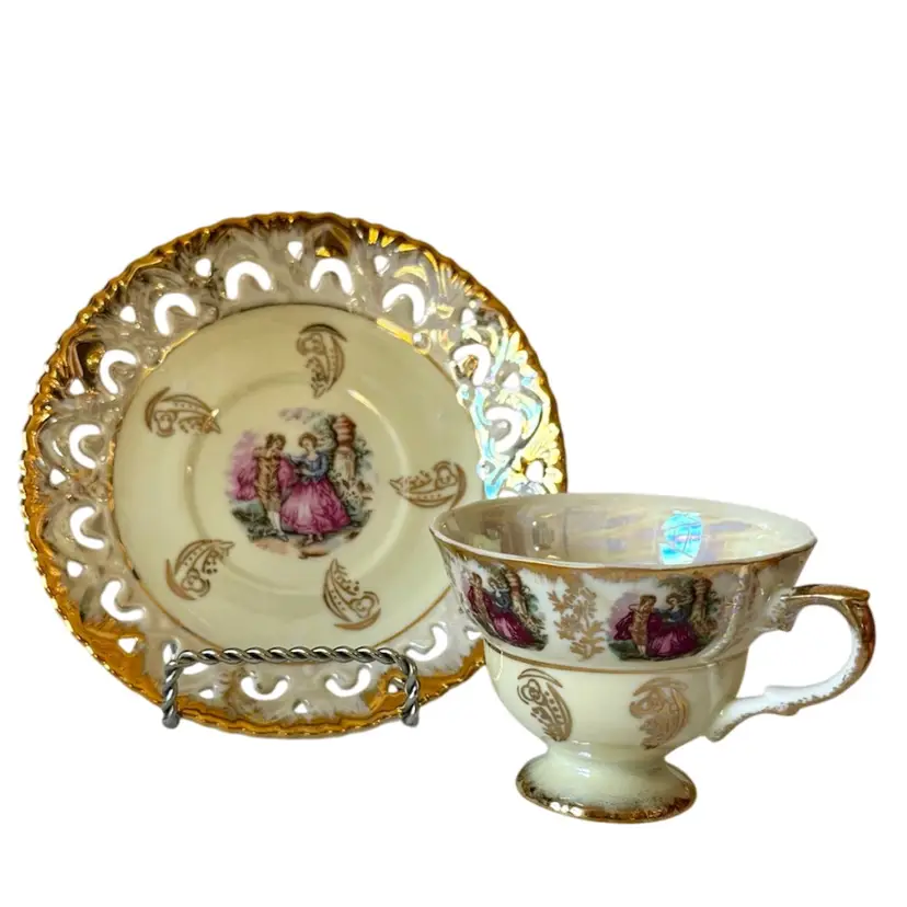 Vintage Porcelain Teacup and Saucer Set Hand Painted Lusterware with Victorian Courting Couple Reticulated Plate W/Label Tilso Japan
Teacup 1-5/8” T x  3-1/2” W
Saucer 6”
