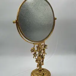 Stylebuilt USA MCM Hollywood Regency Style Gold Tone Standing Cherub Vanity Mirror