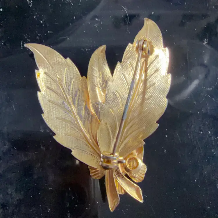 Gold Tone Leaves with a Flower 2”