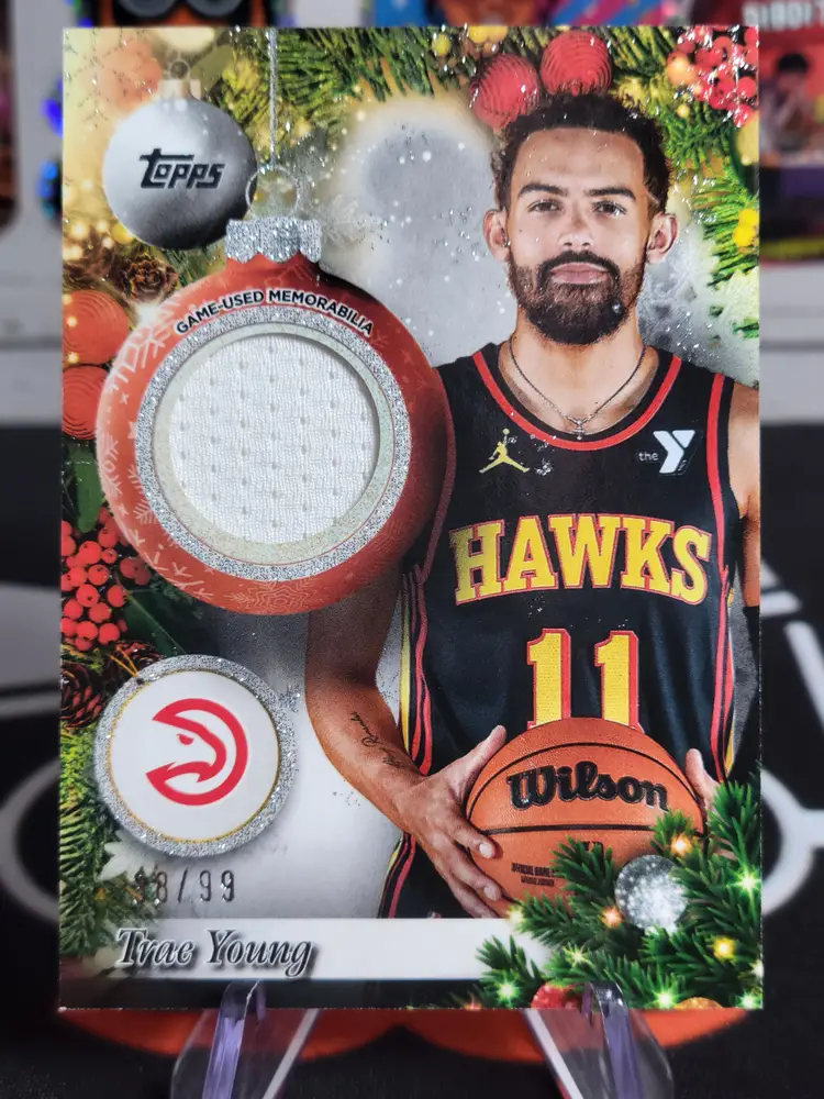 Trae Young 2025-26 Topps Basketball Holiday #PR-TY Player Relic Glitter 38/99