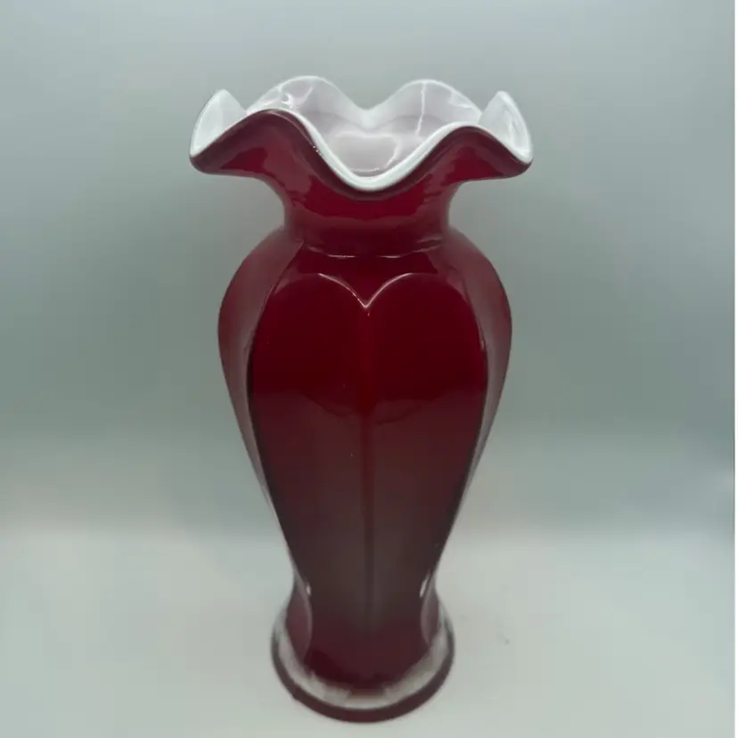 Vintage Ruby Red Cased Art Glass Vase with ruffled white interior.