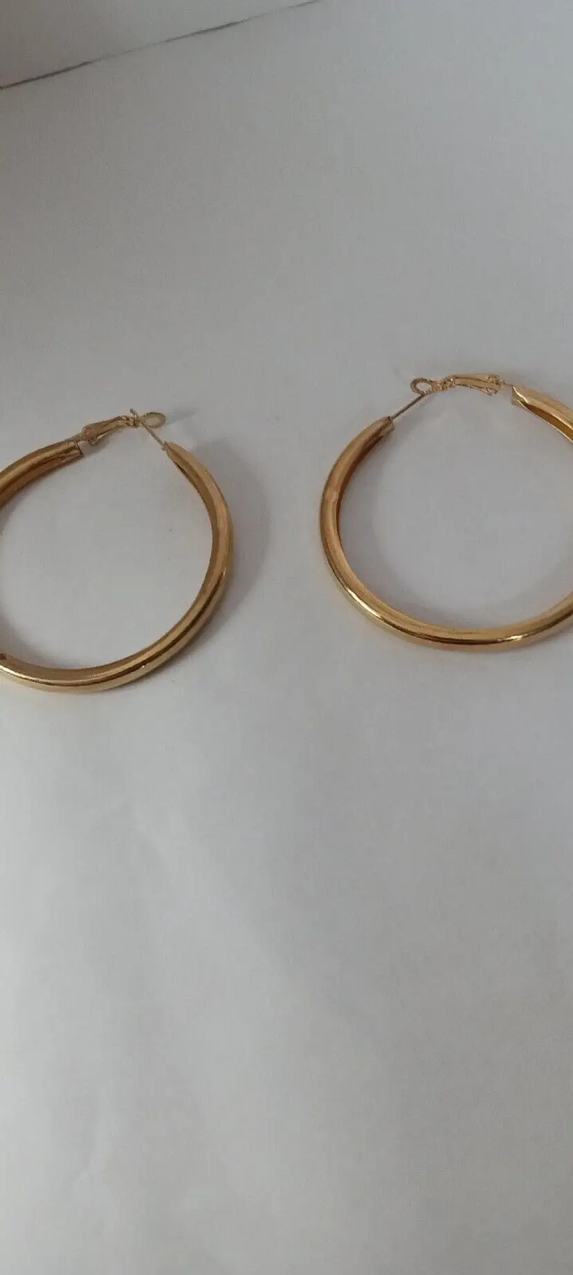 # 112 gold tone  hoop earrings