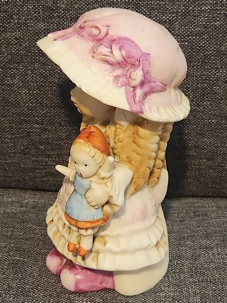 Vintage Ceramic Girl with Doll Figurine