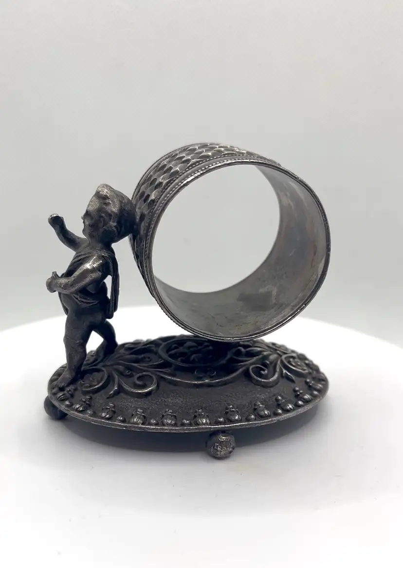 Antique Victorian quadruple silver plate figural cherub napkin ring
