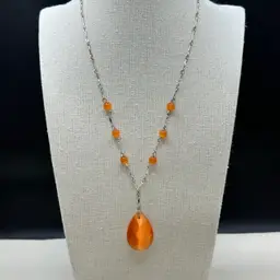 A107 - Avon Orange Bead Y Necklace