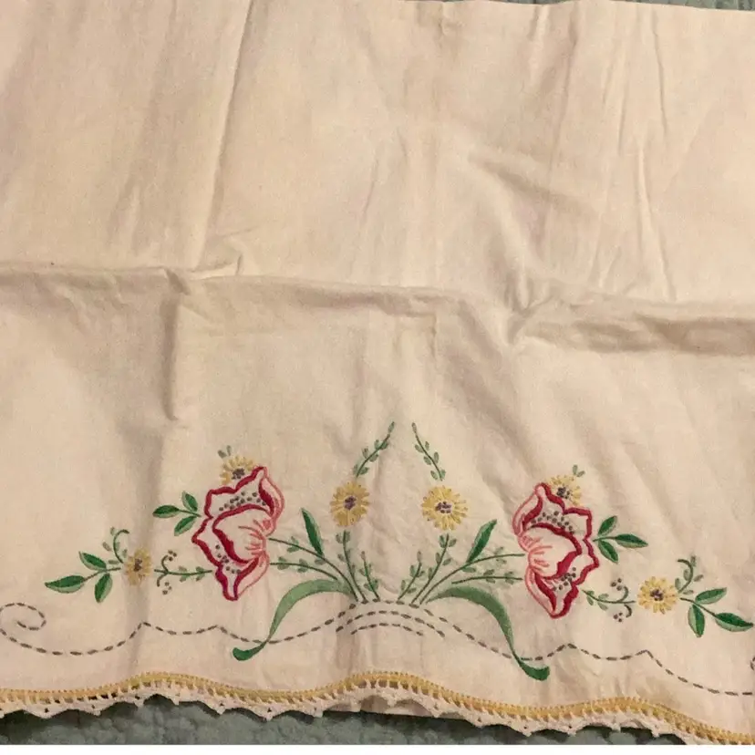 Embroidered flowered, white pillowcase