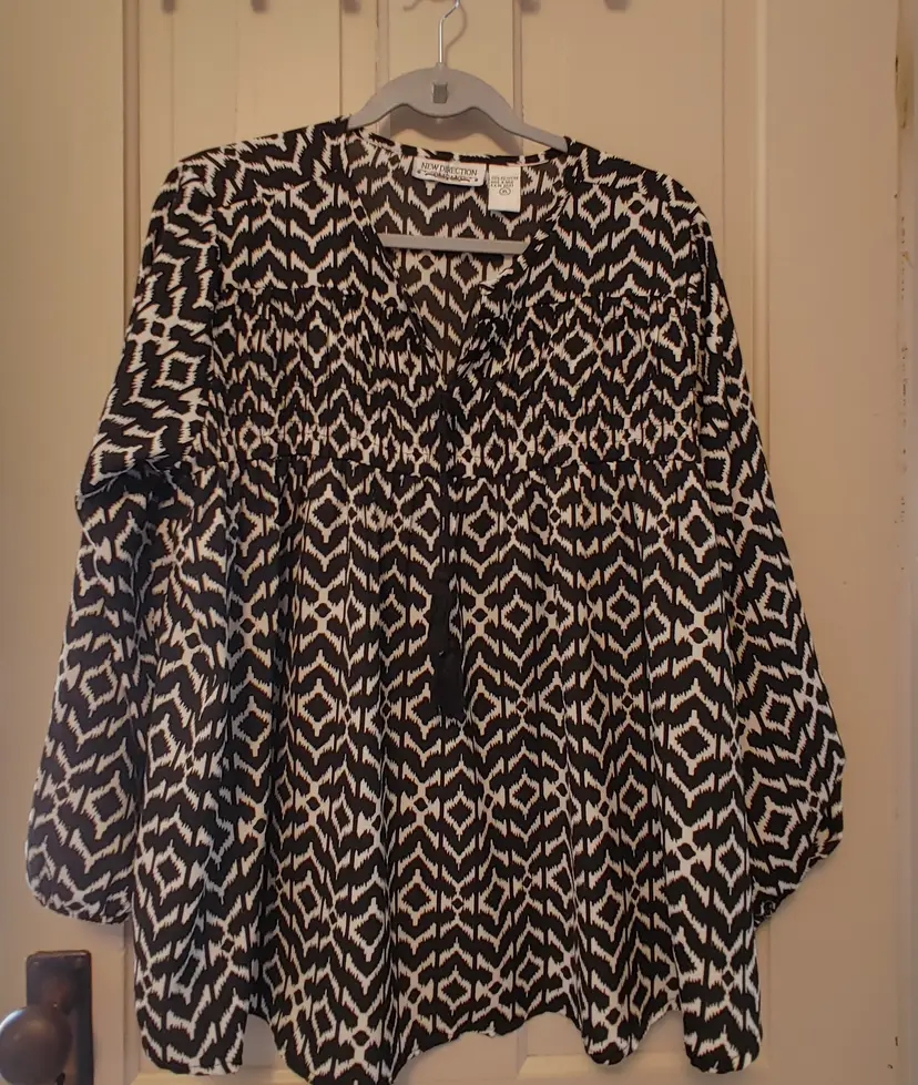 Top- Brand: New Direction. Black & White geometric top. Size XL. Material- 100% polyester. No callouts.