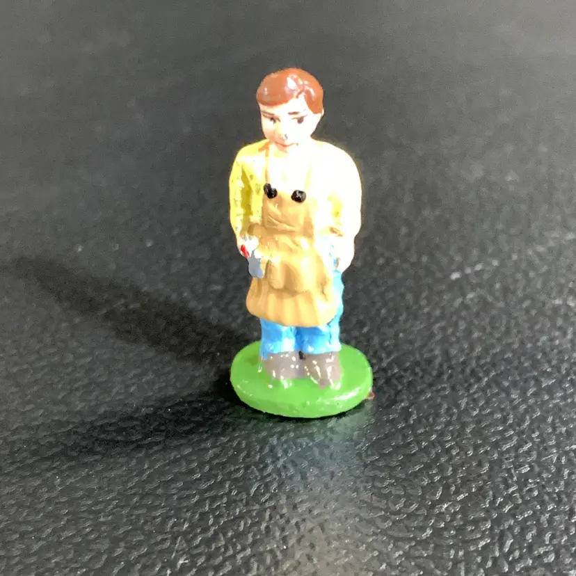 Tiny Metal Man in Apron