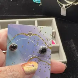 #34 Small Jewelry Item As Shown On Screen