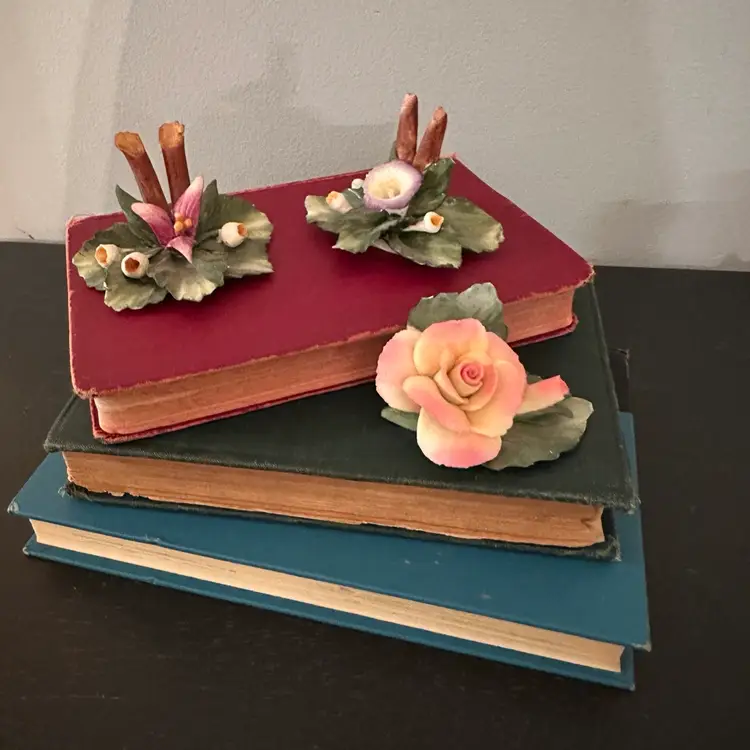 Vintage Capodimonte-style floral decorations.