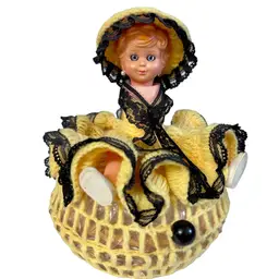 Knit Yellow Doll Cover With Blinking Eyes on Glass Lidded Jar Weirdo