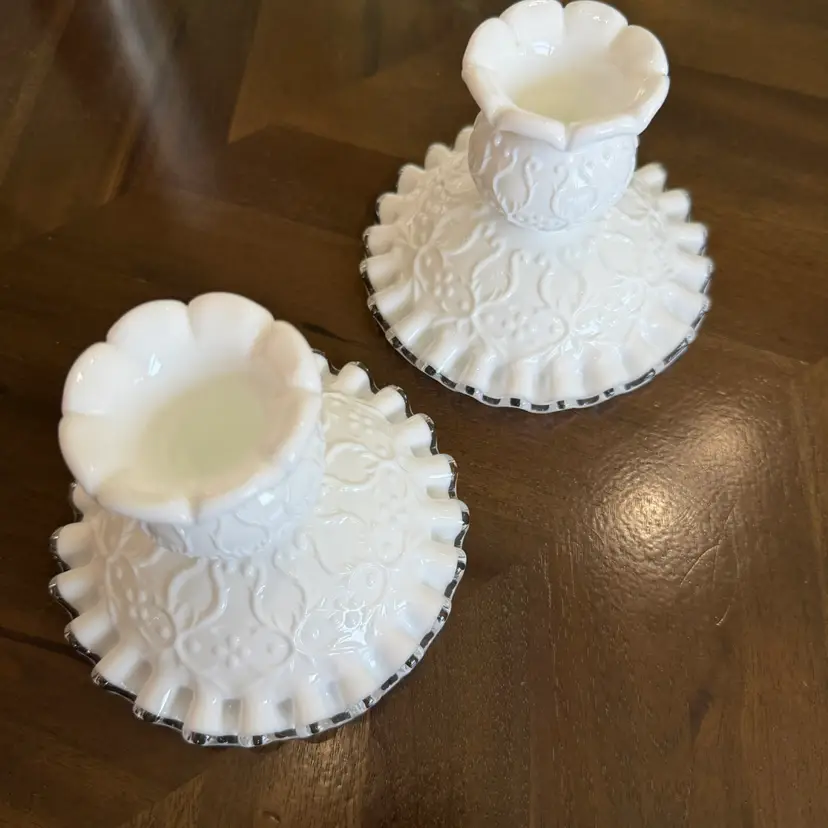 A pair of Fenton Spanish Lace milk glass candle holders with Silver Crest trim Circa 1940S -1960S.