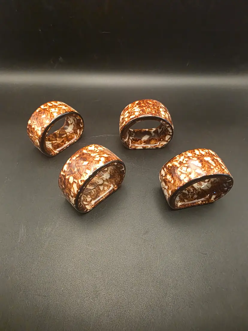 Brown spongeware napkin rings