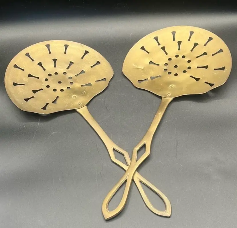 NOT ONE BUT TWO Vintage brass skimmer spoons