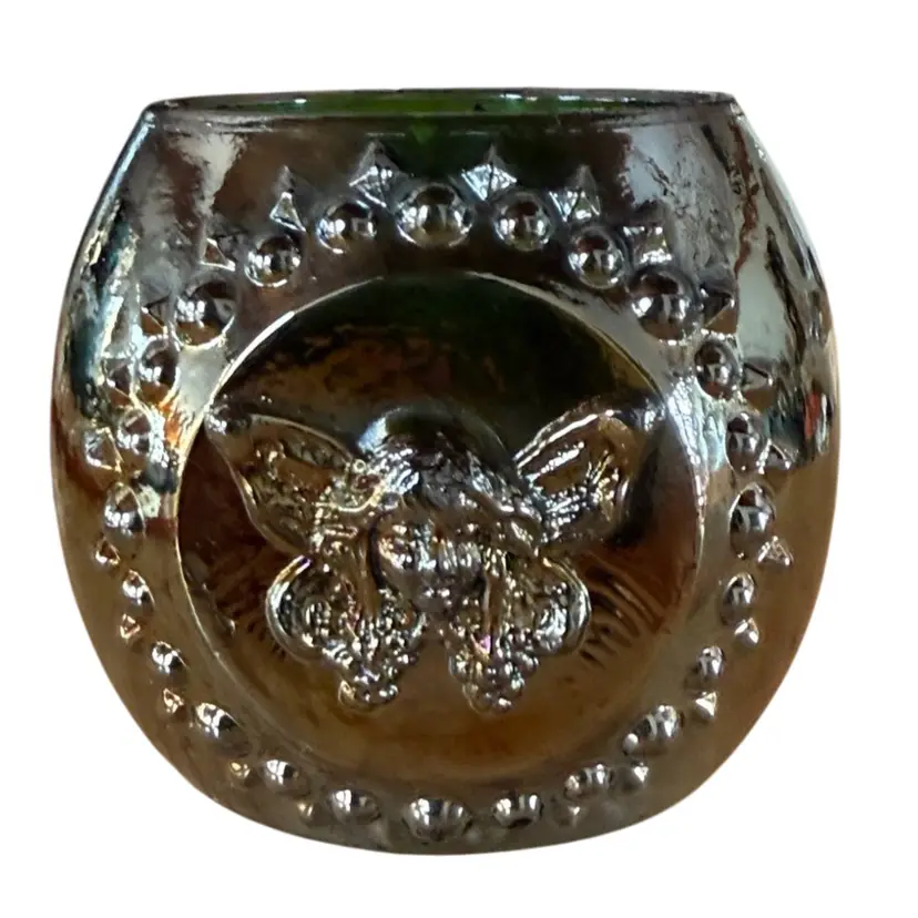 Angel carnival glass candle votive with blue window on the other side