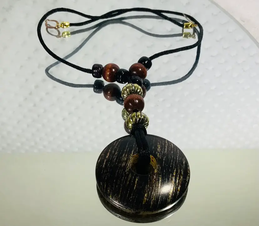 Vintage Monet Costume Jewelry Beaded Necklace Different Gold And Brown Hue Of A Hard Plastic Beads Ribbon And Silver Tone Clasp 