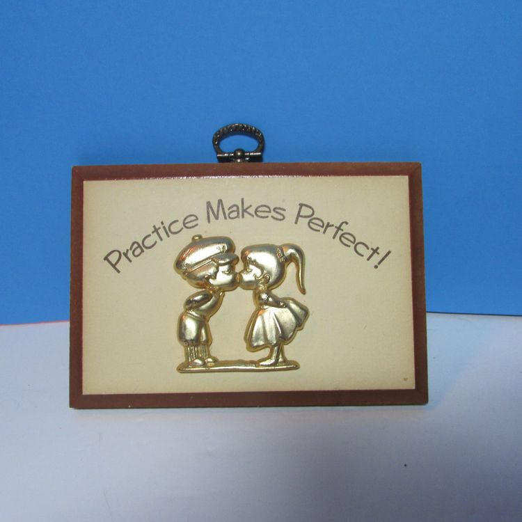 vintage kissing couple wall plaque Practice Makes Perfect