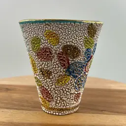 Vintage Mid Century Italian Art Pottery Vase With Gold, White, And Yellow Design And A Teal Color On The Inside.