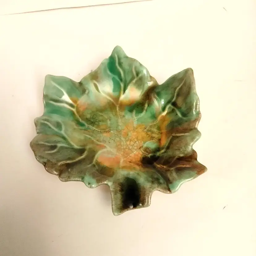 Vintage Hall Pottery #735. Leaf trinket dish. 1 small chip. 5 x 5.25.
