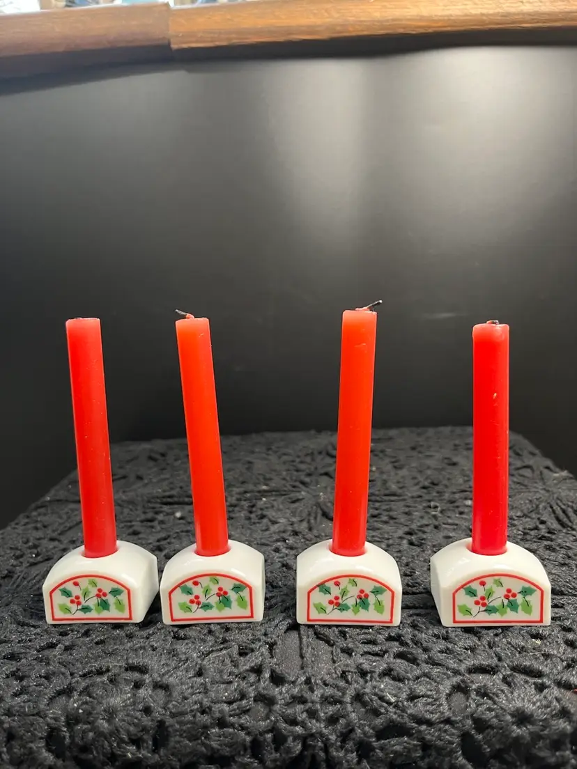 Made in Japan. 4 Candle Holders w/ Holly & Berries. Comes w/ Red Candles.